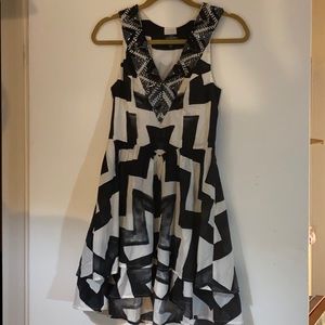 Bebe Beaded flowy dress.